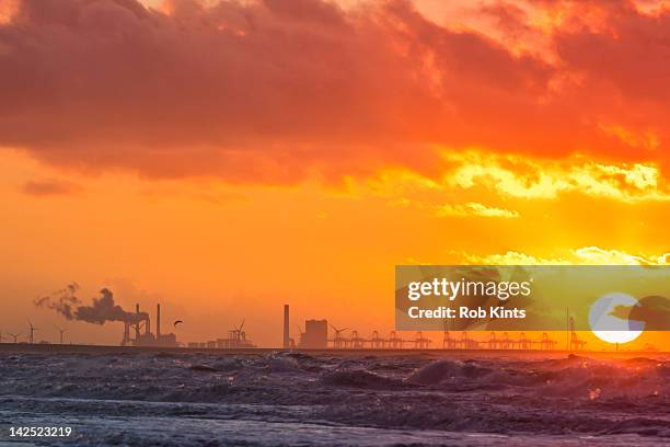 rotterdam europoort at sunset - coal fired power station stock pictures, royalty-free photos & images