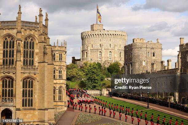The procession led by The dismounted detachment of the Household Cavalry, followed by massed Pipes & Drums of Scottish and Irish Regiments, the...