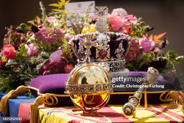 The coffin of Queen Elizabeth II with the Imperial State Crown resting on top, borne on the State Gun Carriage of the Royal Navy departs Westminster...