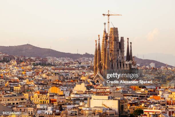 barcelona cityscape with sagrada familia church at sunset high angle view, spain - サグラダ・ファミリア ストックフォトと画像