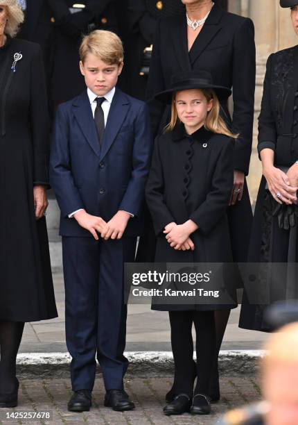 Prince George of Wales and Princess Charlotte of Wales during the State Funeral of Queen Elizabeth II at Westminster Abbey on September 19, 2022 in...