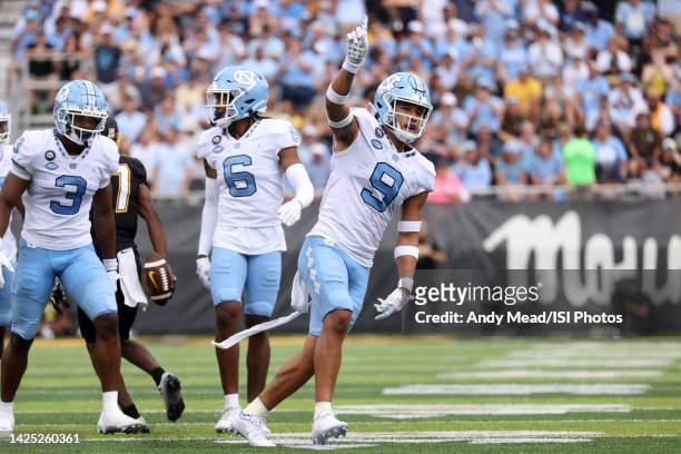 Cam'Ron Kelly of the University of North Carolina celebrates after breaking up a third down pass attempt during a game between North Carolina and...