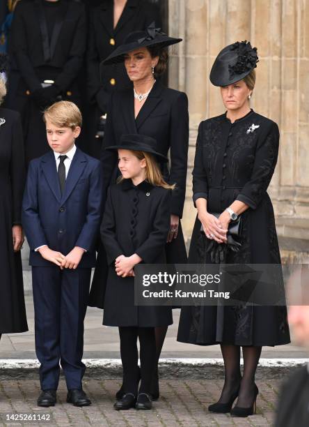 Prince George of Wales, Catherine, Princess of Wales, Princess Charlotte of Wales and Sophie, Countess of Wessex during the State Funeral of Queen...