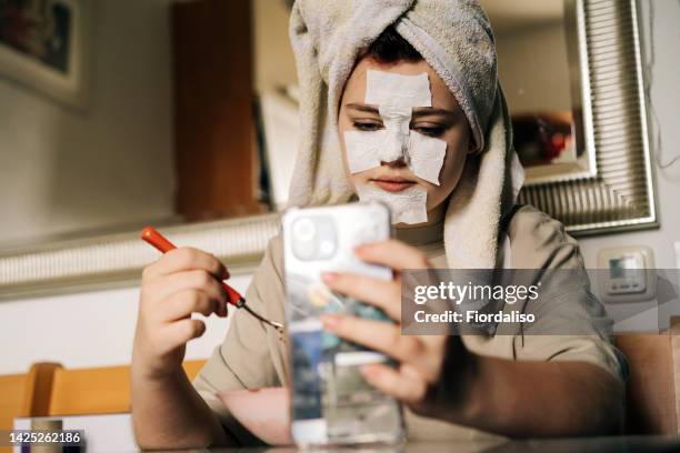 close-up portrait of a young teenage girl - blackhead stock-fotos und bilder