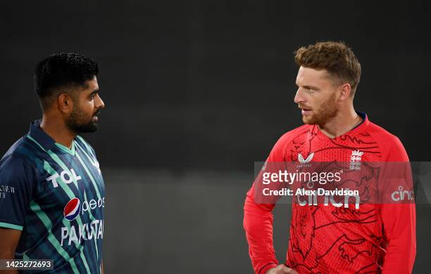 Jos Buttler of England speaks to Babar Azam of Pakistan during a Nets Session at the National Stadium on September 19, 2022 in Karachi, Pakistan.