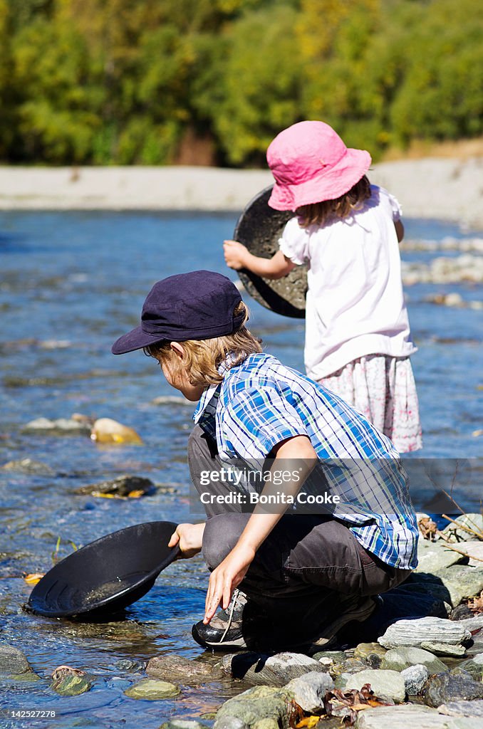 Children panning for gold