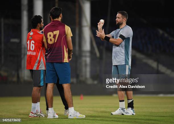 Chris Woakes of England speaks to the Net Bowlers during a Nets Session at the National Stadium on September 19, 2022 in Karachi, Pakistan.