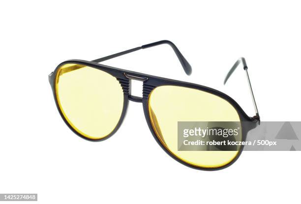 close-up of sunglasses against white background,poland - designer sunglasses stock pictures, royalty-free photos & images