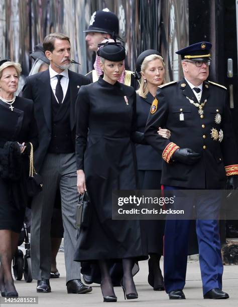 Prince Albert of Monaco and Prince Charlene of Monaco attend the State Funeral of Queen Elizabeth II at Westminster Abbey on September 19, 2022 in...