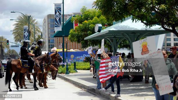 Protestors and supporters faced off outside the Anaheim Convention Center as U.S. Republican Presidential candidate Donald Trump spoke inside during...