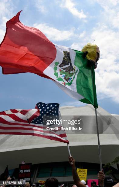 Protestors and supporters face-off with each other as U.S. Republican Presidential candidate Donald Trump was to speak inside Anaheim Convention...