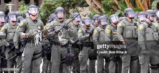 County and local law enforcement had a heavy presence on-scene after a 'failure to disperse' announcement was made to protestors and supporters faced...