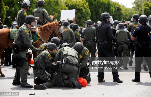 County and local law enforcement had a heavy presence on-scene after a 'failure to disperse' announcement was made to protestors and supporters faced...