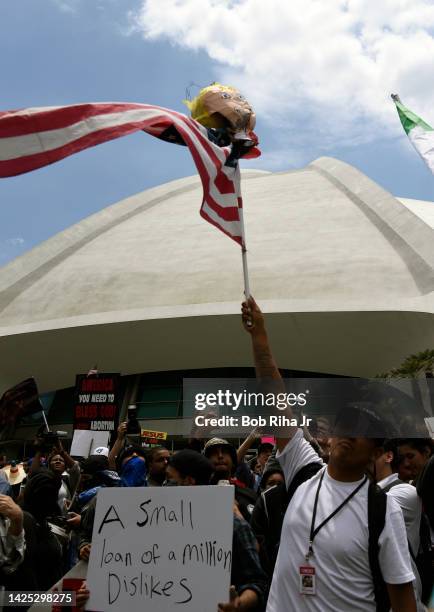 Protestors and supporters face-off with each other as U.S. Republican Presidential candidate Donald Trump was to speak inside Anaheim Convention...