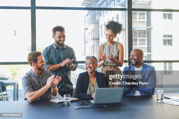 happy, startup and success clapping team on a laptop, celebration of good news, sale or target goal. group collaboration on an online project, logo design or reveal with excited designer partner - diversity logo stock pictures, royalty-free photos & images