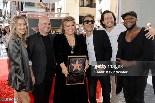 Jessi Collins, Jason Halbert, Kelly Clarkson, guest, Jaco Caraco, and Lester Estelle attend The Hollywood Walk Of Fame Star Ceremony for Kelly...