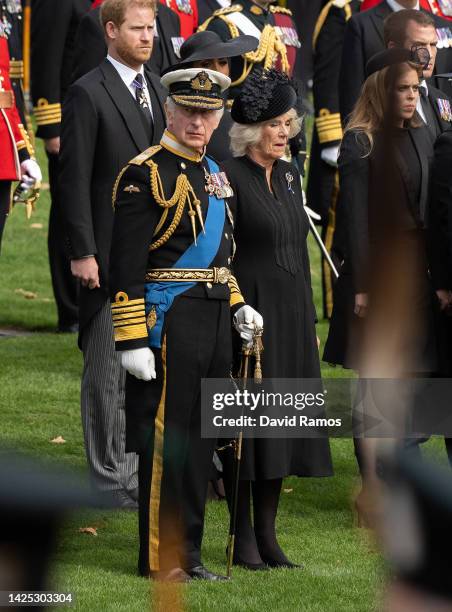 King Charles III and Camila, Queen Consort look on at Wellington Arch after the State Funeral of Queen Elizabeth II on September 19, 2022 in London,...