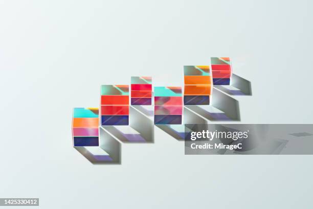 transparent cube prisms arrangement into a line graph - physics diagram stock pictures, royalty-free photos & images