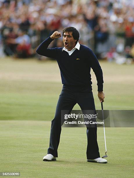 Seve Ballesteros of Spain celebrates after he holes out on the final 18th green to win the 113th Open Championship on 22nd July 1984 on the Old...