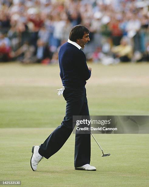 Seve Ballesteros of Spain celebrates after he holes out on the final 18th green to win the 113th Open Championship on 22nd July 1984 on the Old...