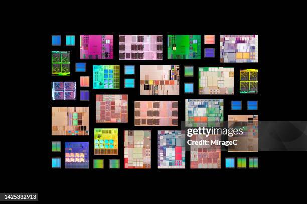 a collection of colorful semiconductor chips on black - manufactured object stockfoto's en -beelden