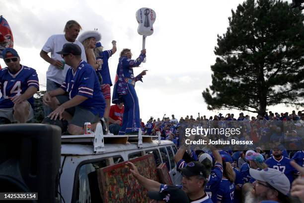 Buffalo Bills fans tailgate outside of the stadium prior to the game between the Tennessee Titans and the Buffalo Bills at Highmark Stadium on...