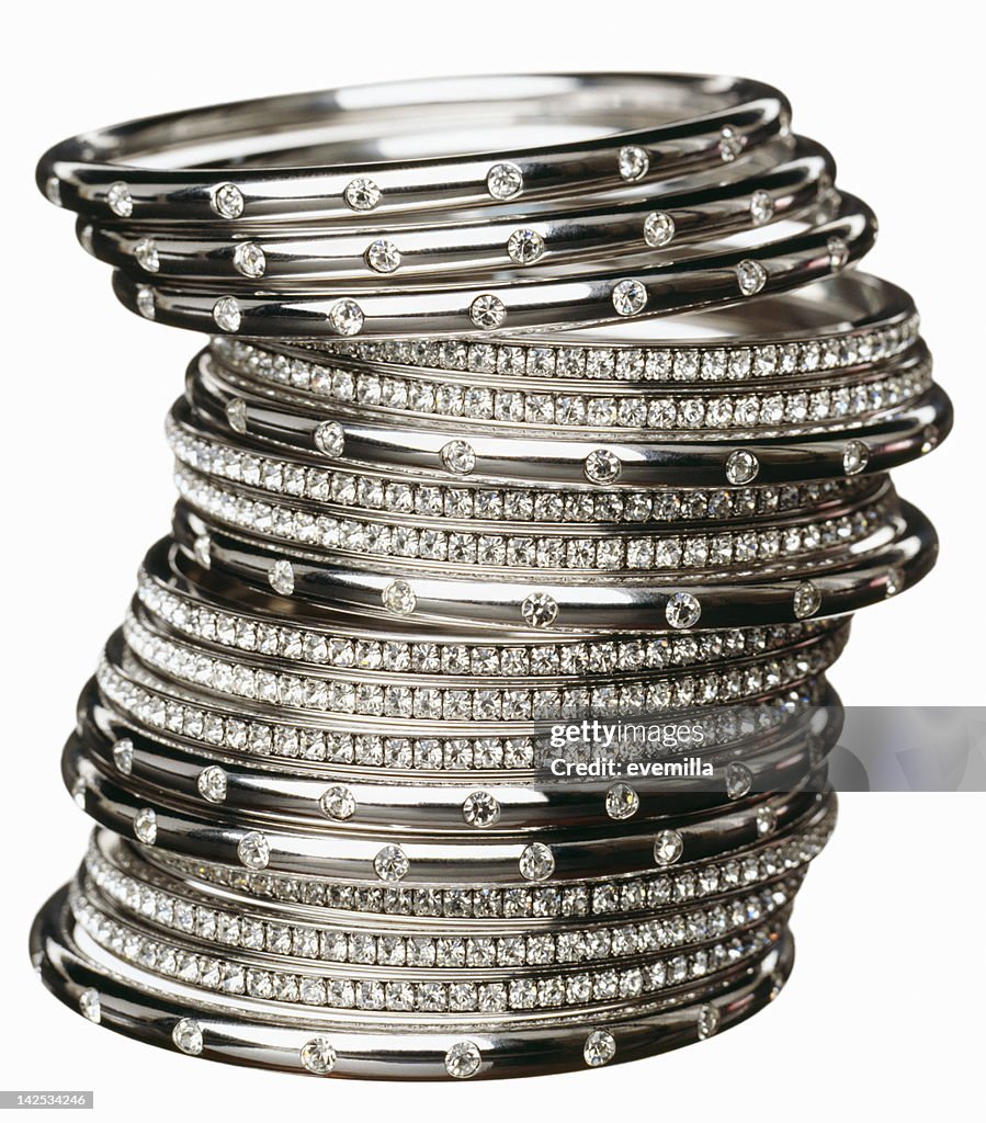 Close-up of several diamond bracelets