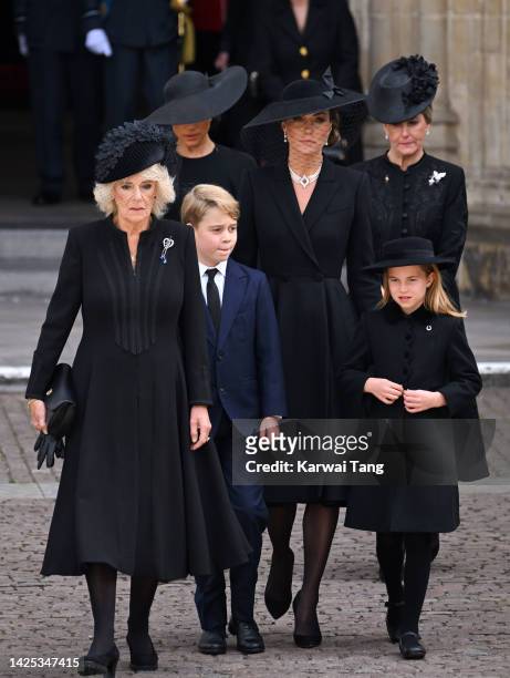 Camilla, Queen Consort, Meghan, Duchess of Sussex, Prince George of Wales, Catherine, Princess of Wales, Princess Charlotte of Wales and Sophie,...
