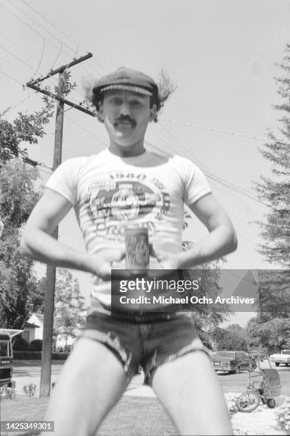 Wearing A Creem Magazine T-Shirt poses for a portrait at home in July 1980 in Los Angeles, California.