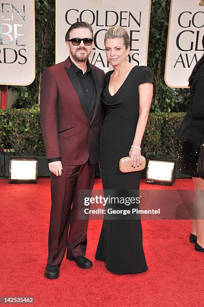 Host Ricky Gervais and producer Jane Fallon arrive at the 69th Annual Golden Globe Awards at The Beverly Hilton hotel on January 15, 2012 in Beverly...