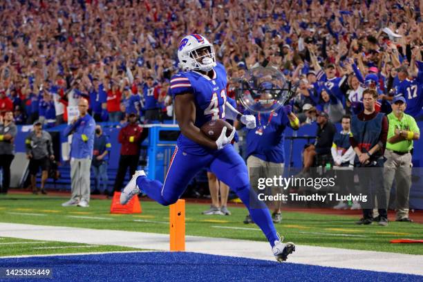 Reggie Gilliam of the Buffalo Bills scores a touchdown against the Tennessee Titans during the first quarter of the game at Highmark Stadium on...