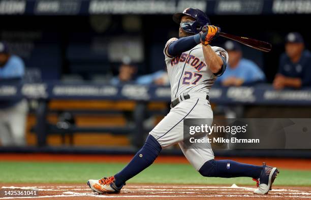 Jose Altuve of the Houston Astros hits a solo home run in the first inning during a game against the Tampa Bay Rays at Tropicana Field on September...