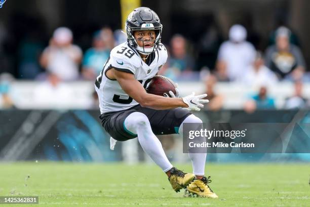 Jamal Agnew of the Jacksonville Jaguars rushes against the Indianapolis Colts at TIAA Bank Field on September 18, 2022 in Jacksonville, Florida.