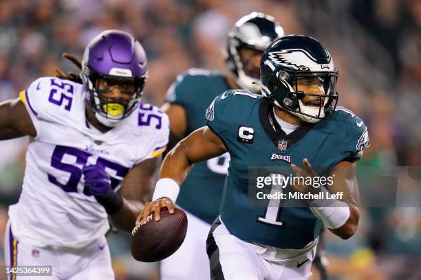 Jalen Hurts of the Philadelphia Eagles carries the ball during the first quarter against the Minnesota Vikings at Lincoln Financial Field on...