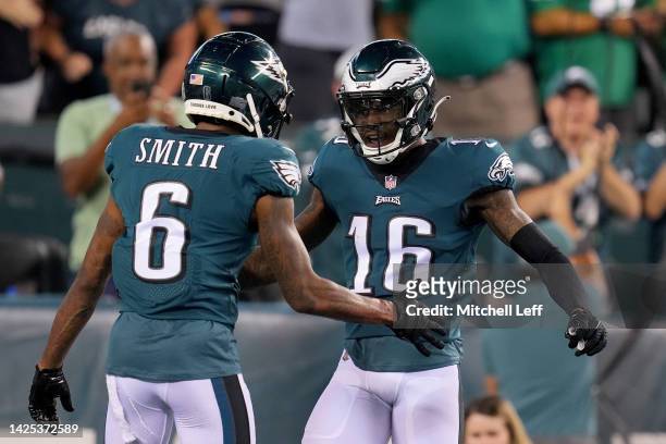 DeVonta Smith and Quez Watkins of the Philadelphia Eagles celebrate a touchdown during the second quarter against the Minnesota Vikings at Lincoln...
