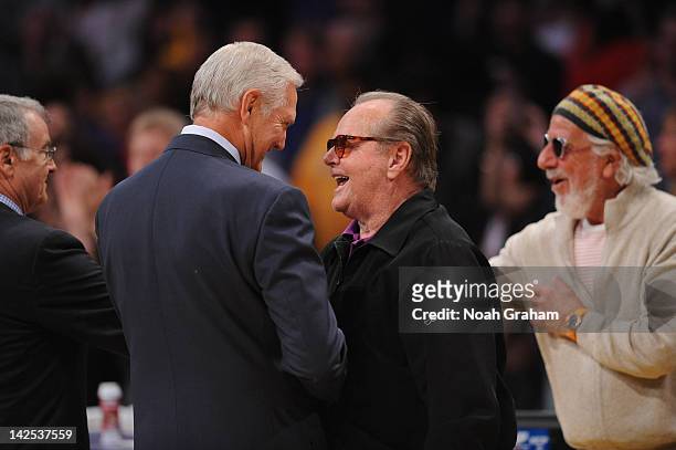 Lakers legend Jerry West is greeted by Actor Jack Nicholson at halftime of a game between the Houston Rockets and the Los Angeles Lakers at Staples...