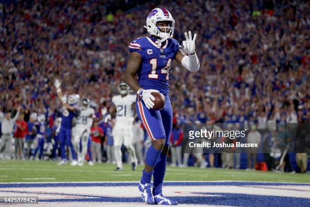 Stefon Diggs of the Buffalo Bills celebrates after scoring his third touchdown of the night against the Tennessee Titans during the third quarter of...
