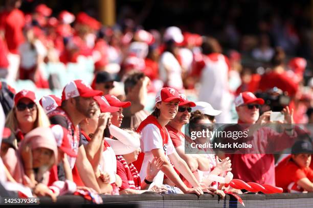 Swans supporters watch on during a Sydney Swans AFL training session at Sydney Cricket Ground on September 20, 2022 in Sydney, Australia.