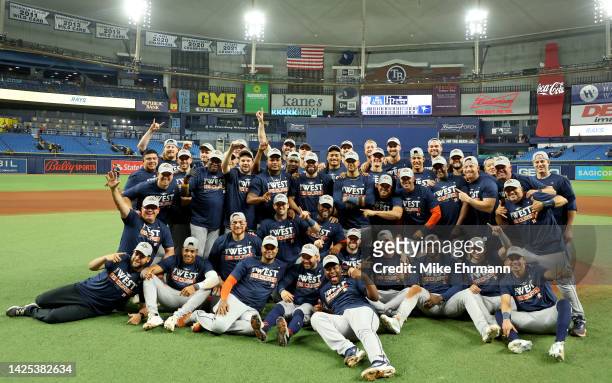 The Houston Astros celebrates winning the American League West Division following a game against the Tampa Bay Rays at Tropicana Field on September...