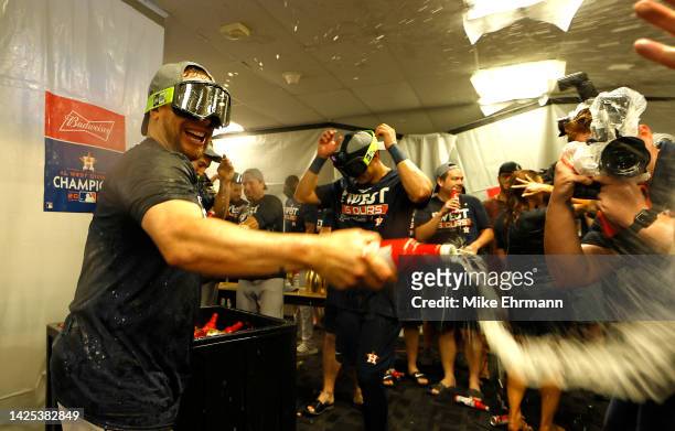 Christian Vazquez of the Houston Astros celebrates winning the American League West Division following a game against the Tampa Bay Rays at Tropicana...