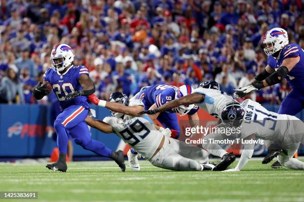 Zack Moss of the Buffalo Bills runs the ball against the Tennessee Titans during the third quarter of the game at Highmark Stadium on September 19,...