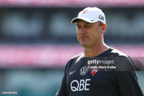 Swans head coach John Longmire watches on during a Sydney Swans AFL training session at Sydney Cricket Ground on September 20, 2022 in Sydney,...