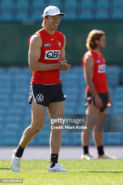 Callum Mills laughs during a Sydney Swans AFL training session at Sydney Cricket Ground on September 20, 2022 in Sydney, Australia.