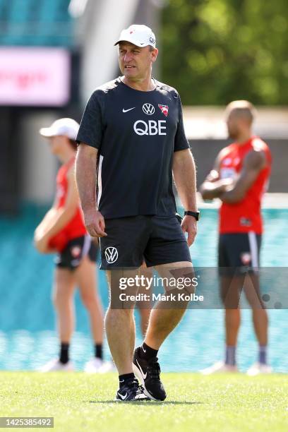 Swans head coach John Longmire watches on during a Sydney Swans AFL training session at Sydney Cricket Ground on September 20, 2022 in Sydney,...