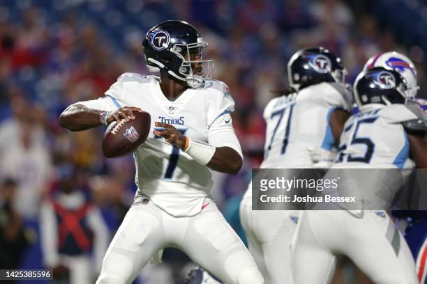 Malik Willis of the Tennessee Titans looks to pass against the Buffalo Bills during the fourth quarter of the game at Highmark Stadium on September...