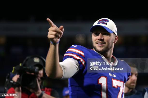 Josh Allen of the Buffalo Bills celebrates after defeating the Tennessee Titans in the game at Highmark Stadium on September 19, 2022 in Orchard...