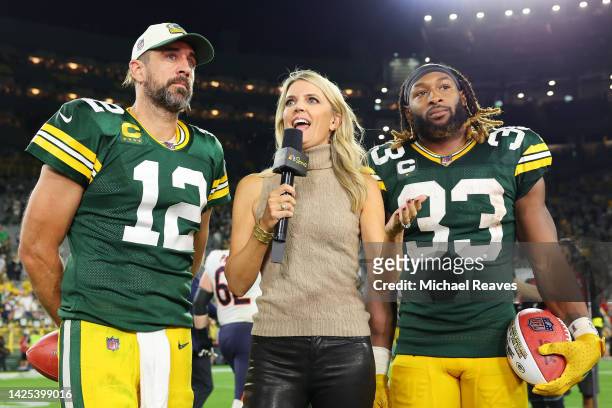 Sideline reporter Melissa Stark interview Aaron Rodgers and Aaron Jones of the Green Bay Packers after they defeated the Chicago Bears at Lambeau...