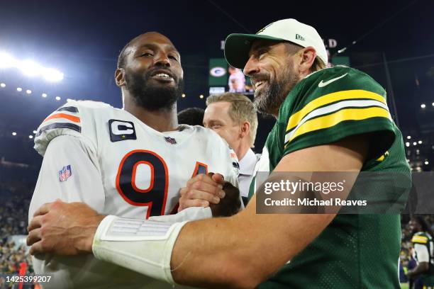 Robert Quinn of the Chicago Bears greets Aaron Rodgers of the Green Bay Packers after the game at Lambeau Field on September 18, 2022 in Green Bay,...