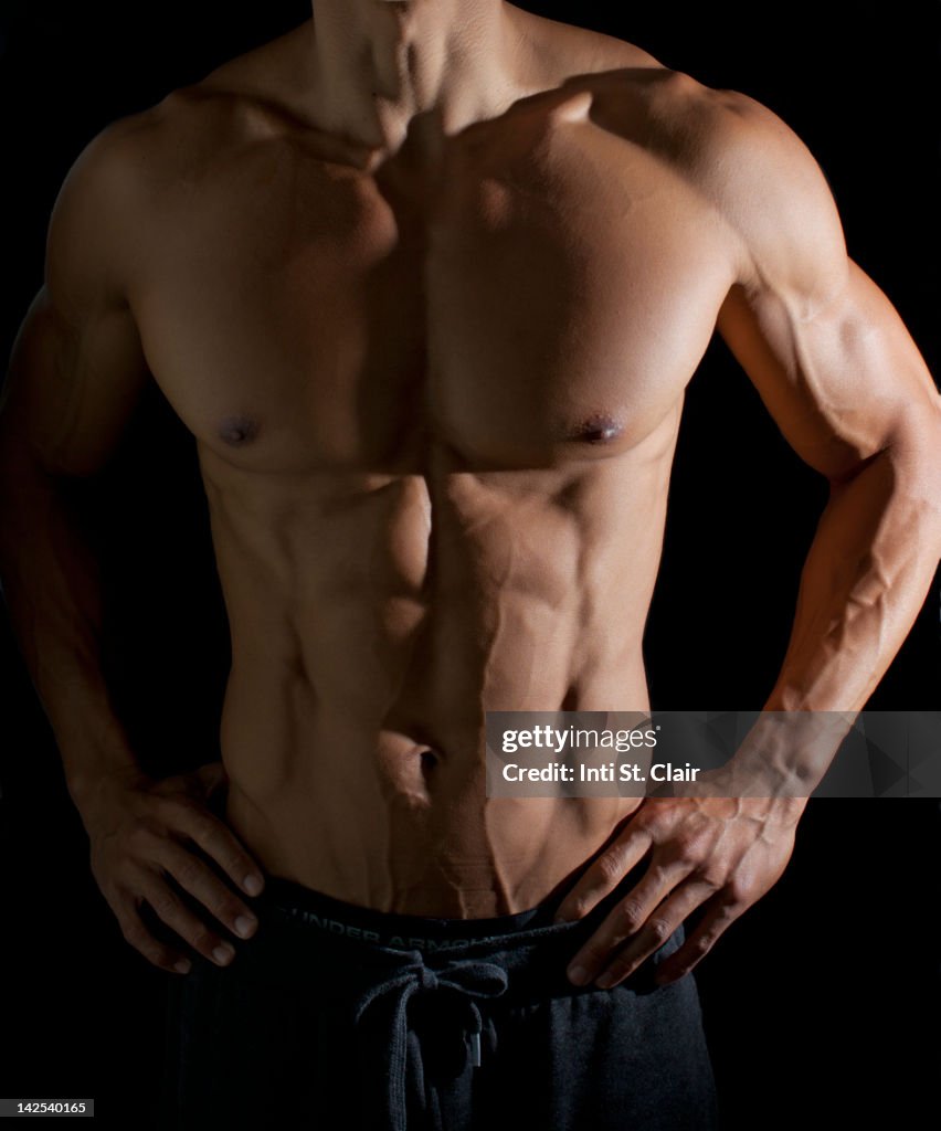 Portrait of very physically fit man