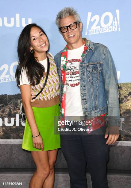 Emily Ting and Johnny Knoxville attend the red carpet premiere of Hulu's "Reboot" at Fox Studio Lot on September 19, 2022 in Los Angeles, California.